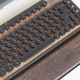 Illustration for article titled They Made A Compact Retro Keyboard Out Of Woodem/em